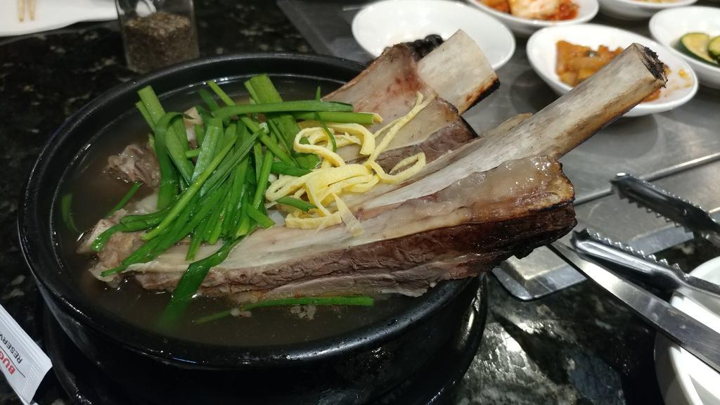 Short Rib Soup (부추 갈비탕) · Short beef rib bone soup, onions daikon, side dish