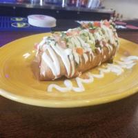 Super Chimichanga · Made with your choice of meat, rice, beans and cheese topped off with sour cream, guacamole ...