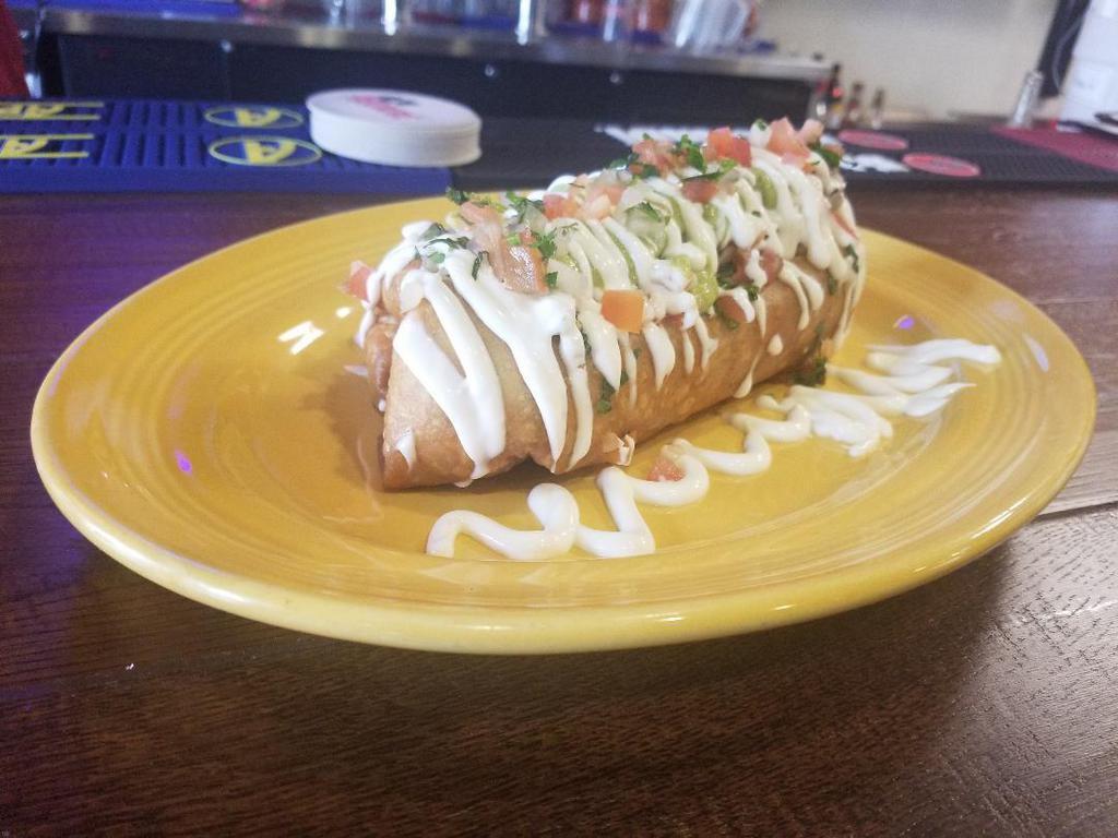 Super Chimichanga · Made with your choice of meat, rice, beans and cheese topped off with sour cream, guacamole and pico de gallo.