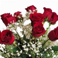 One Dozen Roses Arranged · One dozen roses arranged with baby’s breath.