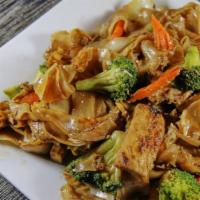 Pad See Ew · Pan fried wide rice noodles with egg, broccoli, and soy sauce. Your choice of chicken, pork,...