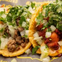 Tacos (2) · Handmade Tortilla, Onions & Cilantro.