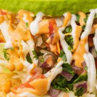 Shrimp Tacos (2)
 · Handmade Tortilla, Shrimp, Onions & Cilantro, Cabbage, Pico De Gallo, Spicy Chipotle Mayo, A...