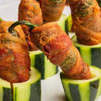Chuper Bacon Wrapped Jalapeños · Stuffed with Cheese, 6 Pieces.
