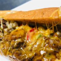 Torrance · korean marinated ribeye steak, American & provolone, bell pepper, white onion, spicy mayo