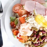 Antipasto Salad · Mixed greens, plum tomatoes, salami, ham, giardiniera veggies, 3 bean salad, shredded cheese...