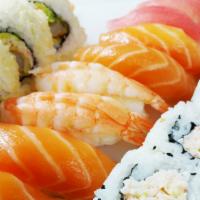 Sushi (8) Combination · 4 salmon, 4 shrimp, half California roll, half crunch roll, rice, salad, miso soup.
