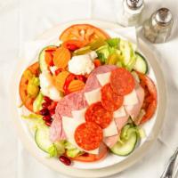Antipasto Salad · Lettuce, tomato, mortadella, salami, provolone cheese, pepperoncini, kidney beans, topped wi...