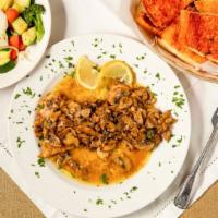 Chicken Marsala · Chicken breast slices sauteed in marsala wine and mushrooms. served with GARLIC BREAD, MIXED...