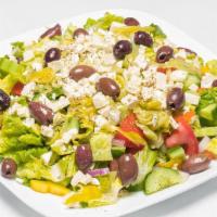 Greek Salad · Romaine, cucumber, tomato, bell pepper, onion, pepperoncini, olives, feta & Greek Dressing