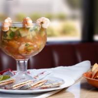 Shrimp Cocktail · Cucumber, avocado, pico de gallo, crackers, and lime.