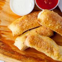 Stuffed Bread · 4 pieces stuffed with mozzarella cheese, brushed with garlic sauce, served with marinara sau...