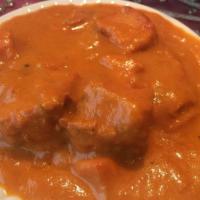 Tikka Masala · Chunks of chicken breast marinated in yogurt & spices, served in a masala sauce.