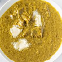 Saag Paneer · Homemade cheese cooked with creamy spinach.