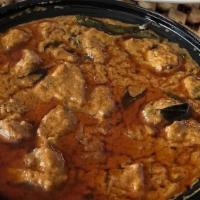 Lamb Curry · Traditional lamb curry cooked with tomatoes and onions. served with basmati rice.