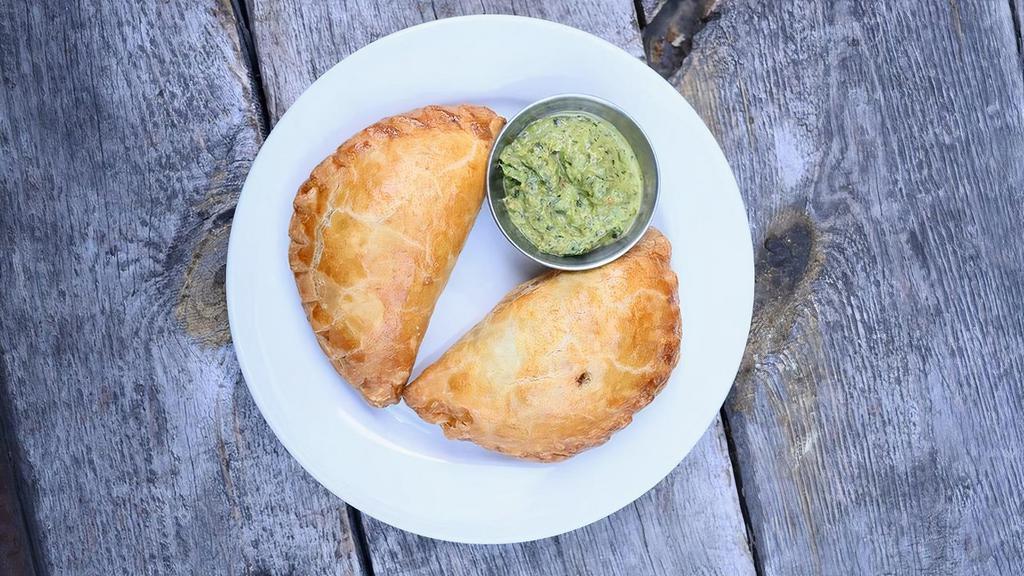 Grass-Fed Beef Empanada · Fresh, grass-fed ground beef, potatoes, onions, garlic and spices. We recommend our fresh house made chimichurri as a dip.