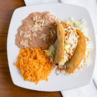 Taco & Enchilada · Shredded beef or Chicken Enchiladas. Served with Mexican rice and beans.