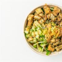 Japanese Bowl · Sesame miso sauce, topped with cucumber, roasted seaweed, tofu croutons, green onions, furik...