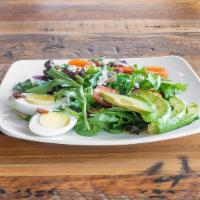 The Cobb Salad · Spring mix, egg, crispy bacon, avocado, tomato, blue cheese.