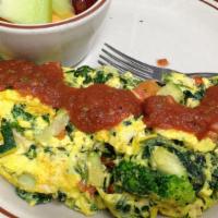 Fresh Veggie Omelette · Filled with fresh bell pepper, onions mushrooms, broccoli, zucchini tomatoes, Jack & Cheddar...
