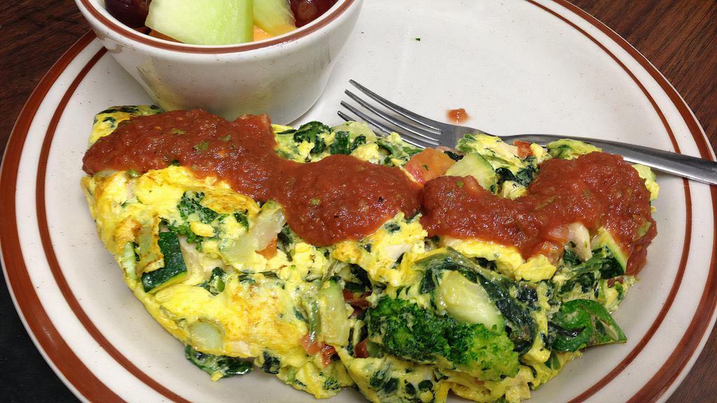 Fresh Veggie Omelette · Filled with fresh bell pepper, onions mushrooms, broccoli, zucchini tomatoes, Jack & Cheddar cheese.