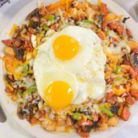 Portuguese Skillet · Linguica, bell pepper, onions, mushrooms & Cheddar cheese, topped with two eggs.