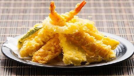 Combo Tempura · Deep fried shrimp and vegetables with tempura sauce.