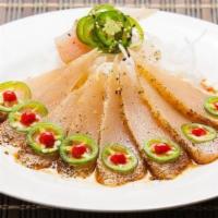 Pepper Fin · Slices of seared albacore with ponzu sauce, topped with jalapenos and spicy sauce.