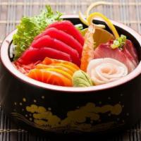 Chirashi Donburi · Assorted sashimi over sushi rice.