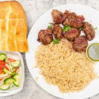 Lamb Teka Kabob · Tender tri-tip lamb marinated, charbroiled to perfection, served with rice and Afghani bread.