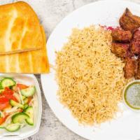 Beef Teka Kabob · Marinated tri-tip beef, charbroiled and served with rice and Afghani bread.