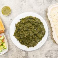 Sabzi · Fresh spinach cooked with special seasoning, served with rice and Afghani bread.