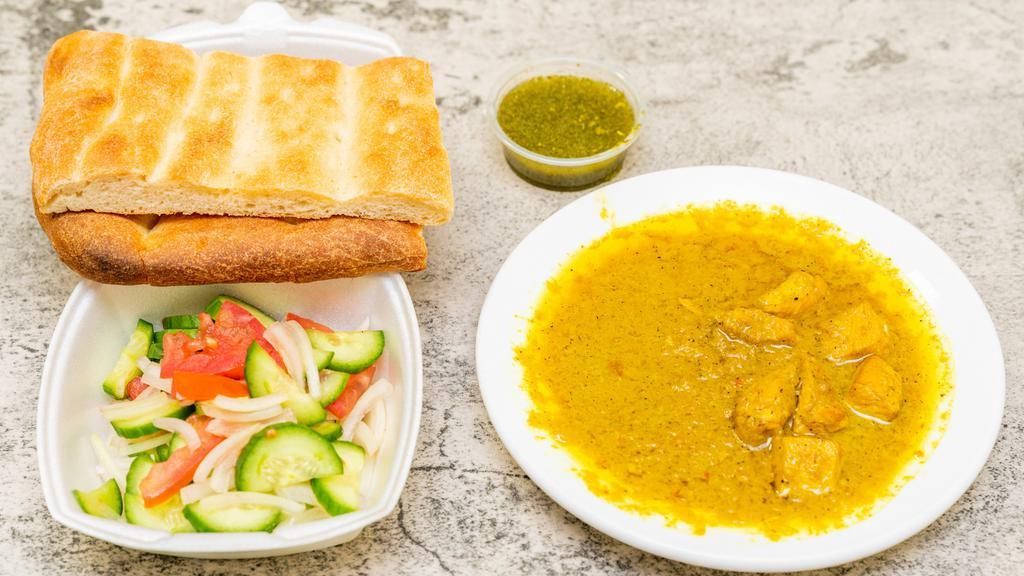 Chicken Curry · Boneless chicken breast prepared in a special seasoning, curry sauce, served with rice and Afghani Bread.