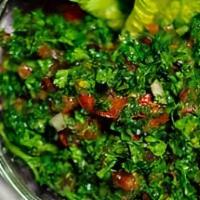 Tabouli · A fresh mix of finely minced parsley, diced onions, chopped tomatoes, fresh mint and cracked...