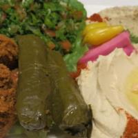 Veggie Plate · All vegetarian served with hummus, Baba ghannouj, tabouli, two grape leaves, two falafel bal...