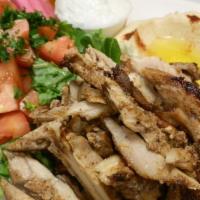 Chicken Shawerma · Marinated chicken breast and thigh, cooked on vertical broiler, then thinly sliced, served w...