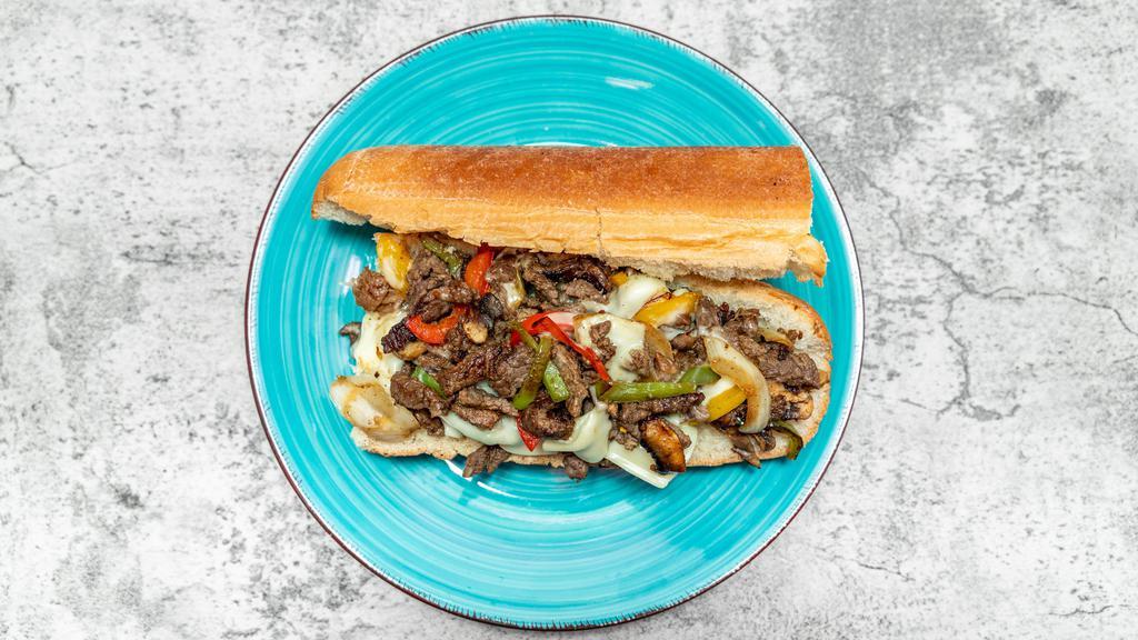 Philly Cheesesteak (Chicken Or Beef) · Grilled meat with mushrooms, onion, green pepper, cheese.