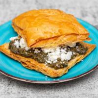 Spanakopita · Spinach, onion, feta cheese filled in pastry dough.