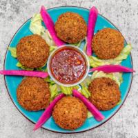 Falafel (6 Pieces) · Fried chickpeas come with tahini or tzatziki sauce and side bread.