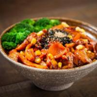 Spicy Teriyaki Chicken Bowl · Steamed white rice topped with grilled teriyaki chicken, broccoli, carrots and corn with spi...