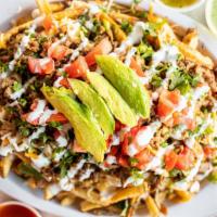 Carne Asada Fries · House Cut Fries, topped with shredded Mexican cheese blend, carne asada, pico de gallo (toma...