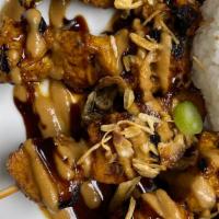 Chicken Sate (New!) · skewered and grilled soy chicken topped with almond sweet sauce and fried onion. served with...