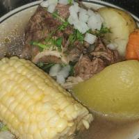 Caldo De Res · Beef stew potato carrots chayote and corn with tortillas.