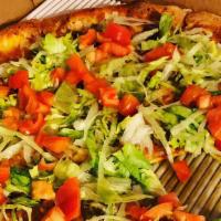 Vegetarian Pizza · Green peppers, mushrooms, olives, onions, and roma tomatoes.
