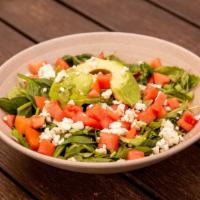 Arugula Salad · Arugula and spinach, with bleu cheese crumbles, avocado and tomatoes, served with balsamic v...