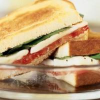 Caprese Melt · Griddled sandwich with melty mozzarella cheese, tomato, basil, on your choice of bread.