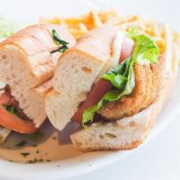 Milanesa De Pollo Sandwich · Fried breaded thin cut of chicken breast, lettuce, tomato and mayonnaise. Sandwiches served ...
