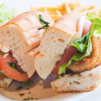 Milanesa De Carne Sandwich · Fried breaded thin cut of beef, lettuce, tomato, and mayonnaise. Sandwiches served in a fres...