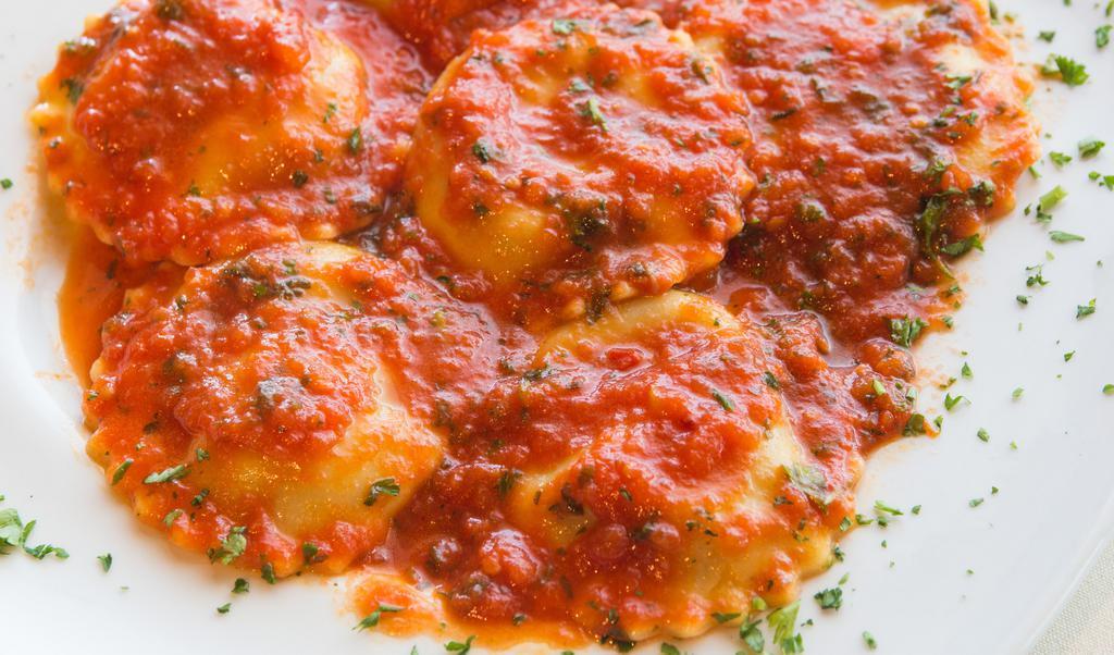 Ravioles Mabel · Raviolis filled with beef or ricotta cheese in fresh tomato sauce with garlic and basil.