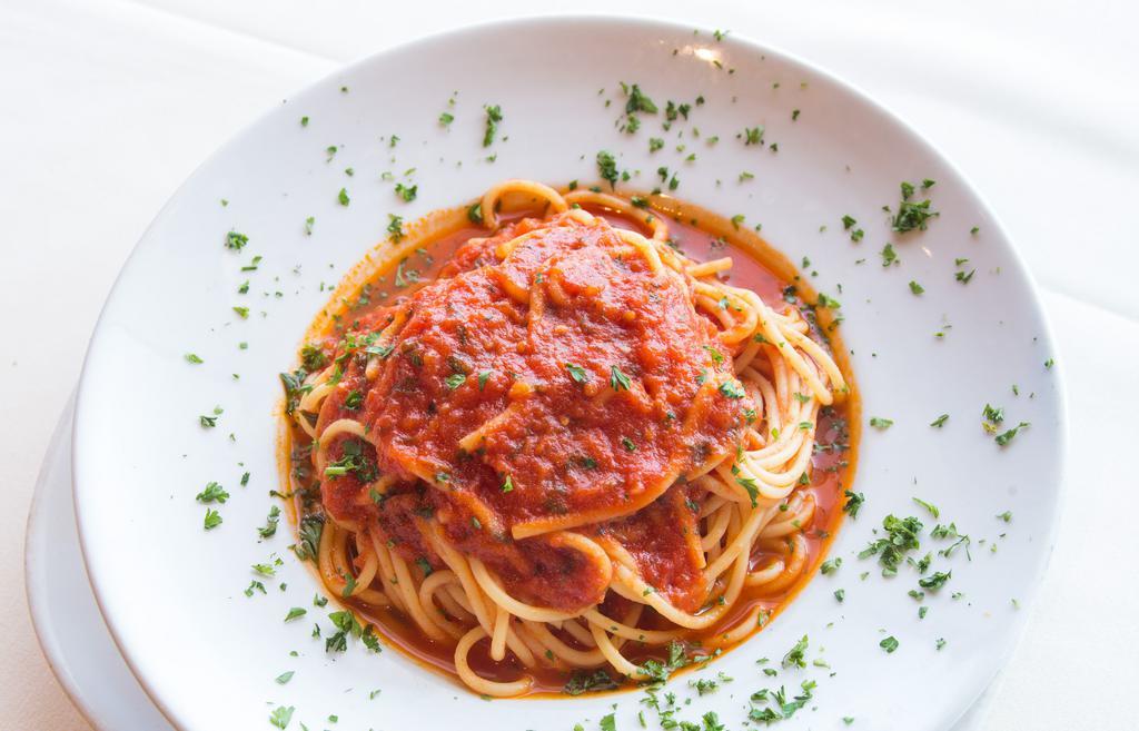 Spaguetti · Spaguetti pasta in fresh tomato sauce with garlic and basil.